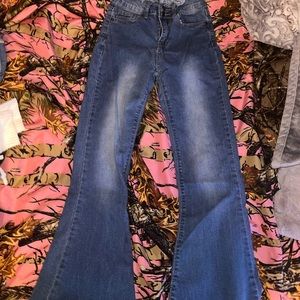 between us blue jeans , flare size 5